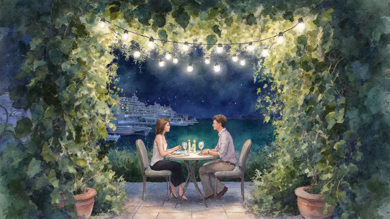 Intimate garden patio with candlelit table for two, surrounded by string lights and vines.
